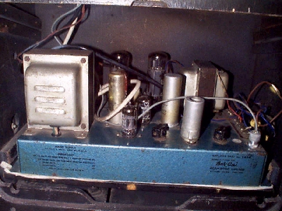 Then there's the amp. This is the thing that sits between the stylus/cartridge on the record and the loudspeakers.
